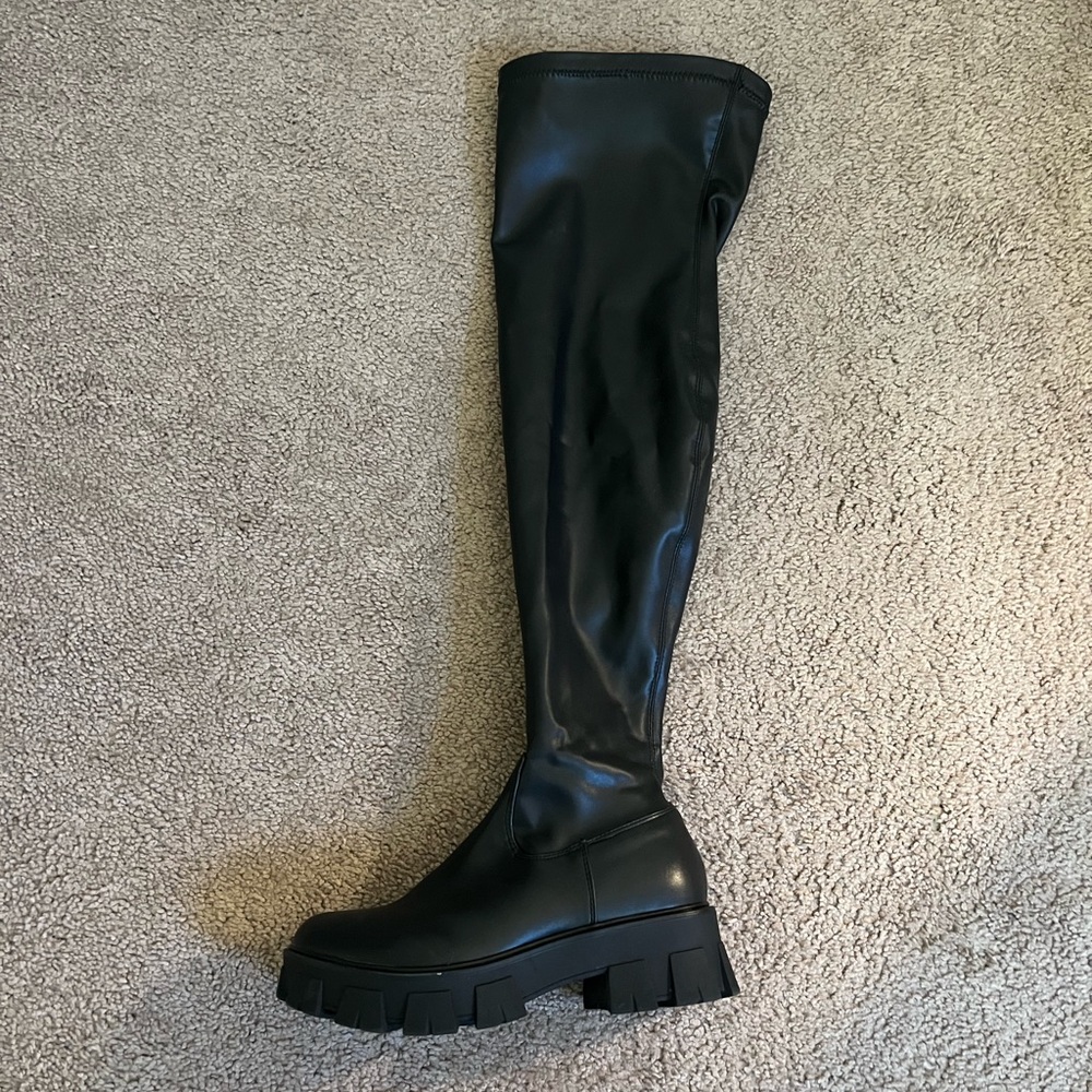 Black knee high lug sole boots